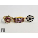 Three 9ct hallmarked stone set rings, sapphire, ruby and amethyst examples, total weight 10g. (3).
