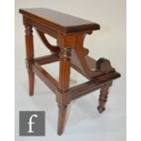 A set of late 20th Century mahogany library steps in the style of Gillows, raised to a turned and