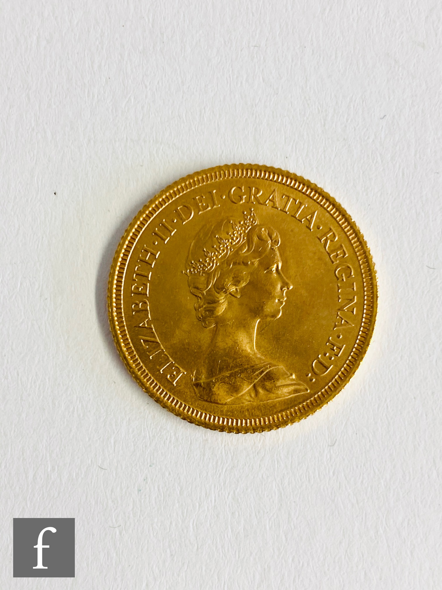 An Elizabeth II full sovereign dated 1978.