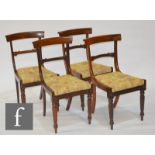 A set of four William IV rosewood yoke-back dining chairs, with reeded and tapered front legs (4)