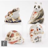 Four boxed Royal Crown Derby paperweights comprising a frog, turtle, squirrel and panda, all with