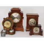 An Edwardian inlaid mahogany mantle clock with Arabic silvered dial on bracket feet, a Rotherham