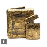 An early 20th Century Japanese shakudo style cigarette case decorated with a phoenix to one side and