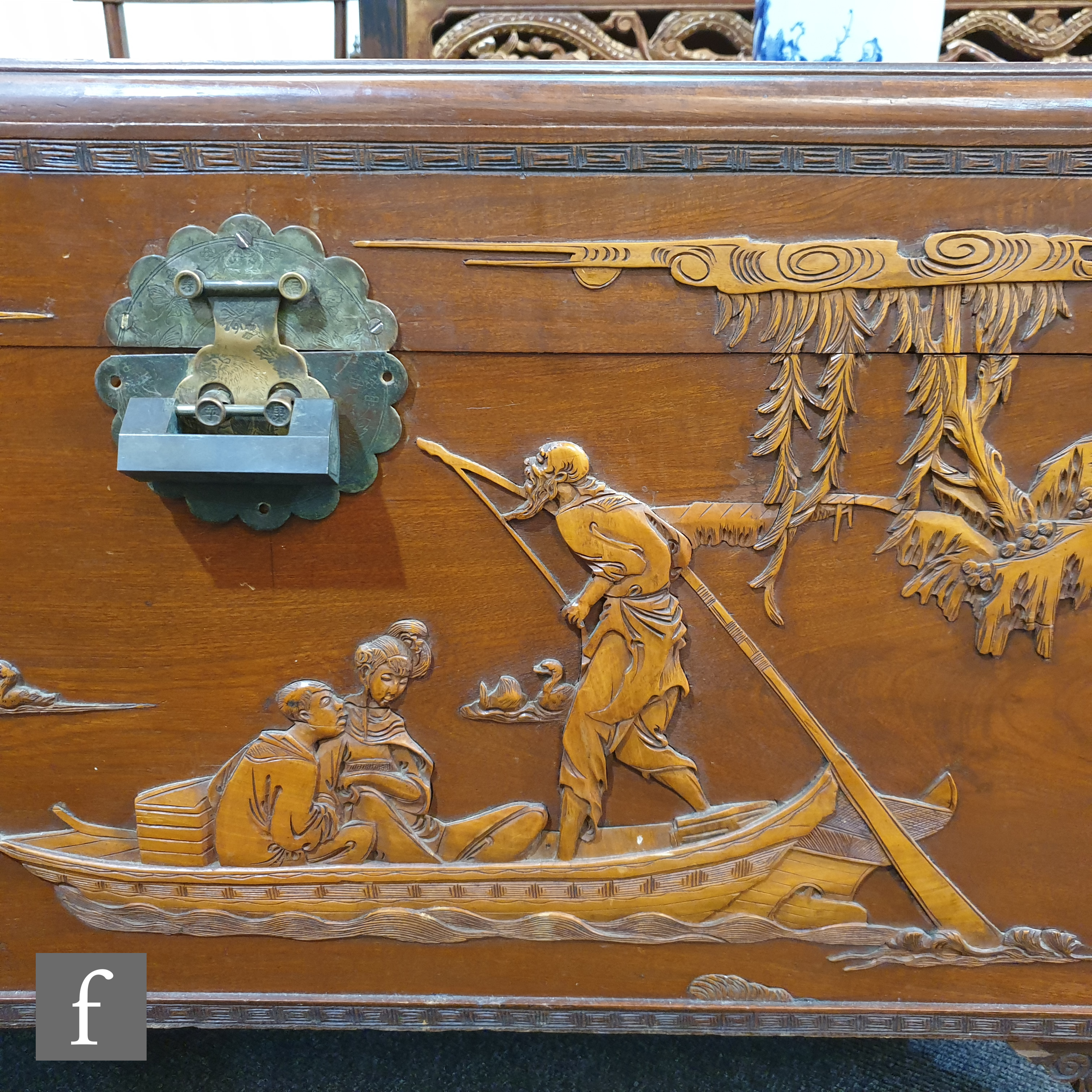 A 20th Century carved camphorwood coffer with raised design detailing goats, figures and landscape - Image 6 of 10