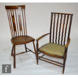 An Arts and Crafts fireside armchair in the manner of Morris & Co for Liberty, together with a