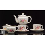 A Royal Crown Derby 'Derby Posies' tea for two comprising teapot, two cups and saucers, milk jug,