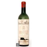 A bottle of 1955 Chateau Mouton Rothschild No 042666