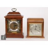 A post 1950s burr walnut small bracket clock by Garrard London, height 22cm, and a similar cased