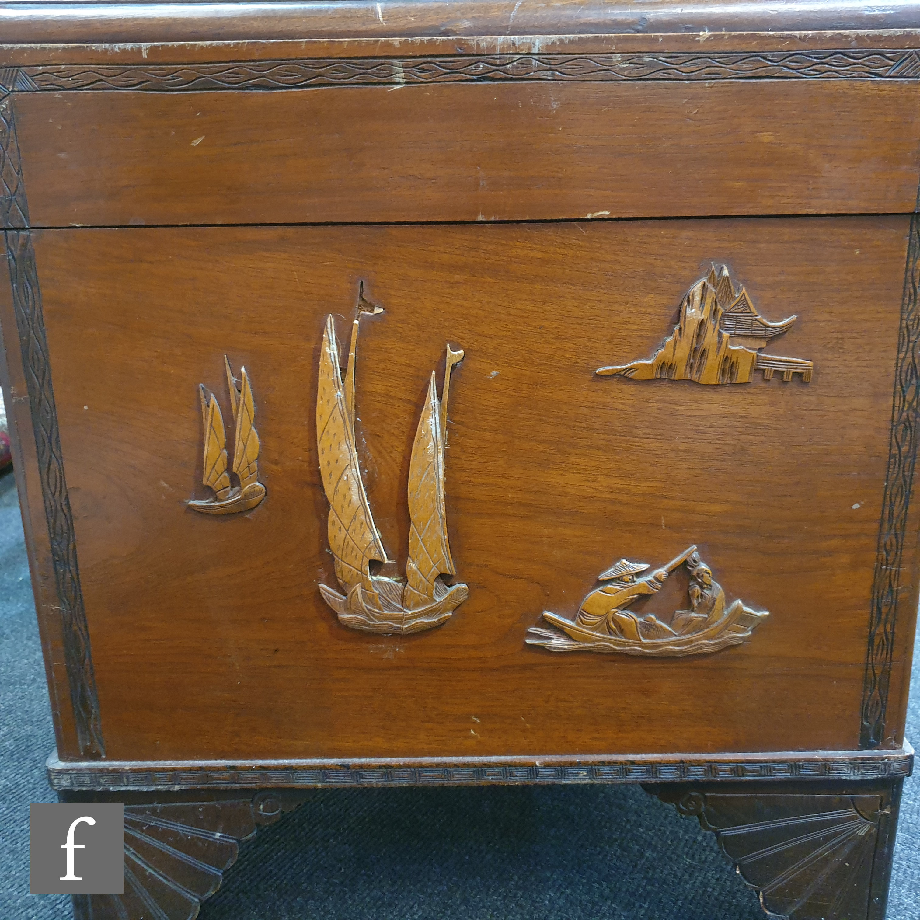 A 20th Century carved camphorwood coffer with raised design detailing goats, figures and landscape - Image 8 of 10