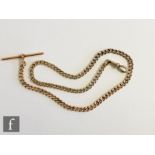 An early 20th Century 9ct rose gold single Albert chain with T bar and end swivel, length 38cm,