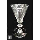 A Georgian ale glass, circa 1790, with conical bowl, bladed knop and folded shallow foot, height