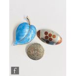 A Norwegian silver and blue enamelled brooch modelled as a leaf, with two Mexican brooches to