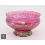 A later 20th Century Royal Brierley studio glass bowl of footed form with everted rim, decorated