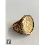 A Edward VII full sovereign dated 1905 loose set to a 9ct ring mount, total weight 16.5g.