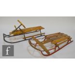 A 1930s wooden sledge with steering wheel and handbreak and a Sparton wooden slatted sledge (2)