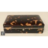 A late 19th Century rectangular tortoiseshell box opening to reveal stamp compartments, marked