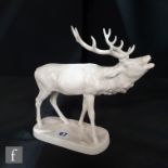 An early 20th Century Nymphenburg blanc de chine model of a stag, green printed shield mark,