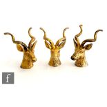 Three hallmarked silver gilt studies of Spiral-horned Antelope heads, possibly knife rests, each 7cm