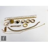 A parcel lot of assorted 9ct items to include six assorted rings, bracelets, tie slide and chains,
