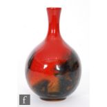 A Royal Doulton Flambe Veined bud vase, shape 1606 decorated with a fissured and mottled flambe