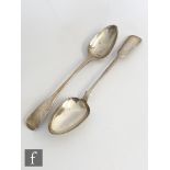 Two hallmarked silver fiddle pattern basting spoons, total weight 9oz, Newcastle 1870, Thomas Sewell