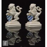 A pair of mid 20th Century Nymphenburg blanc de chine models of Bavarian Lions modelled by Ernst