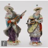 A pair of Continental figures of Malabar musicians, modelled after the original Meissen figures by