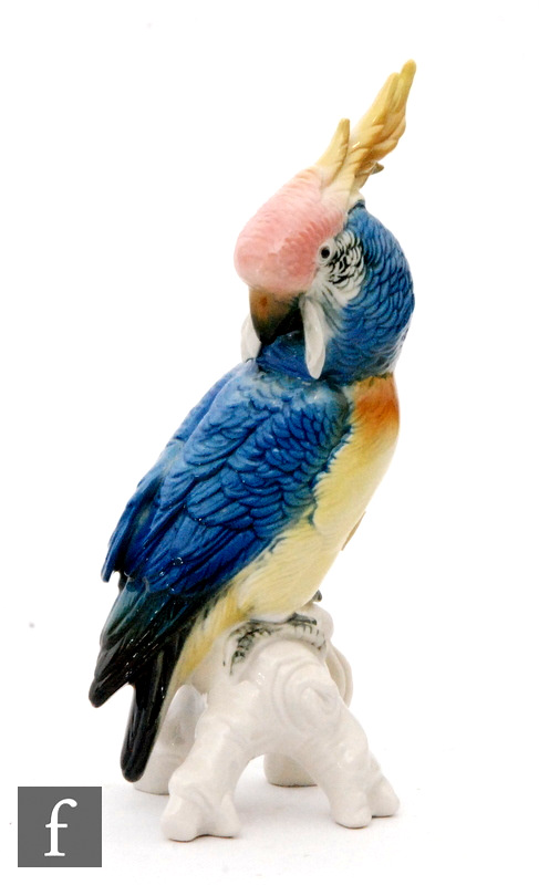 An early 20th Century Karl Ens model of a stylised parrot perched upon a branch, printed mark,