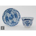 A Chinese blue and white Kraak style bowl and saucer, each with scalloped lotus form rim, painted