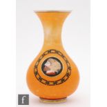 An opaline glass vase, circa 1860, of footed ovoid form with tall collar neck and flared rim, enamel