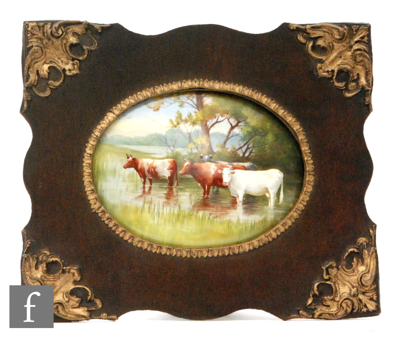 A framed Doulton Burslem oval plaque decorated by H. Marrey with cows in a boggy landscape,