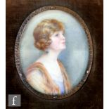 DORIS PUSINELLI, RI (1900-1976) - Portrait of a Lady, miniature on ivory, signed and dated '23,