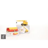 Two boxed Dinky Supertoys diecast models, a 991 AEC Shell Chemicals Tanker in red and yellow and a