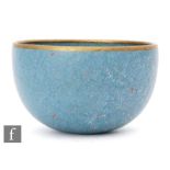 A contemporary studio pottery high sided bowl by Gary Wornell decorated with an all over blue