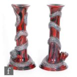 A pair of Royal Doulton Archives, Burslem Artwares candlesticks 'Panya Snake' (BA23) and 'Puning