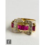 An Art Deco 15ct diamond and red spinel ring, the rectangular head with channel set baguette cut