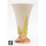 A Clarice Cliff My Garden shape 701 trumpet vase decorated with moulded autumnal flowers to the