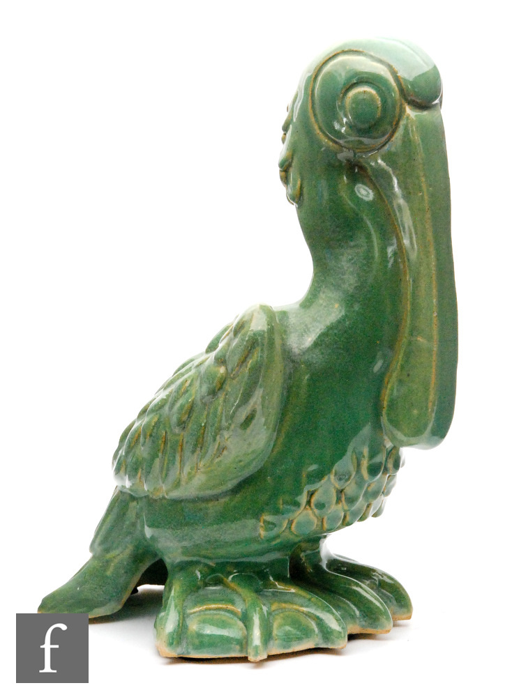 A 1930s Art Deco model of a pelican glazed in green, possibly Dutch, unmarked, height 25cm S/D