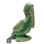 A 1930s Art Deco model of a pelican glazed in green, possibly Dutch, unmarked, height 25cm S/D