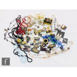 A parcel lot assorted costume jewellery to include rings, earrings, bangles, beads, brooches etc.