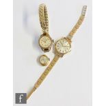 A ladies 9ct hallmarked Vertex wrist watch batons to a silvered dial and 9ct bracelet, total