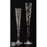 Two contemporary Royal Brierley oversized glass champagne flutes, both with a long funnel bowl, long