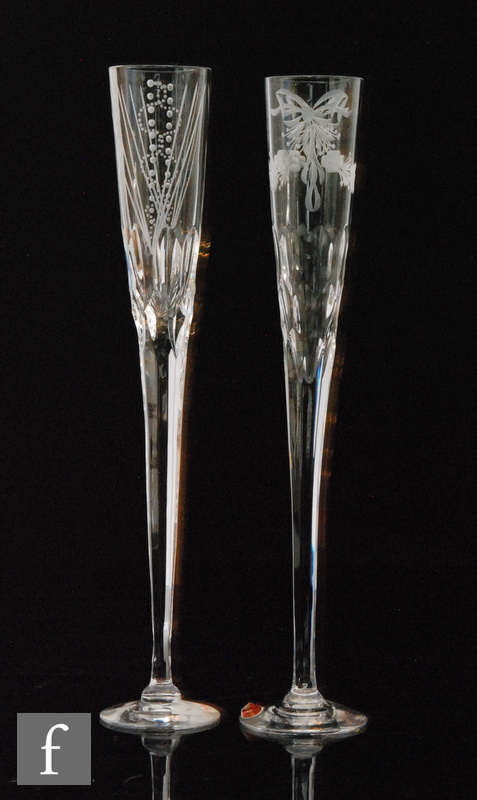 Two later 20th Century Royal Brierley clear crystal oversized champagne flutes, each with long