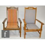 A pair of late 20th Century folding beech steamer or deck chairs, with fabric sling seats and backs,