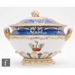 A large 19th Century tureen and cover, the body and slightly domed cover decorated with cornflower