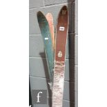 A pair of early 20th Century wooden skis named Swarzwald and a similar pair of blue painted skis (4)