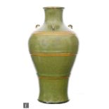A Chinese 'Teadust' glazed vase, of meiping form with short lug handles, the shoulder and body