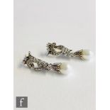 A pair of Continental white gold freshwater pearl and diamond drop earrings, pearl terminal below