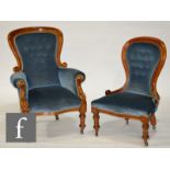 A Victorian walnut spoon-back armchair, together with a ladies salon chair en-suite, S/D. (2)