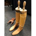 A pair of early 20th Century sectional beech boot trees, each labelled ‘Tom Hill, Knightsbridge Ltd,
